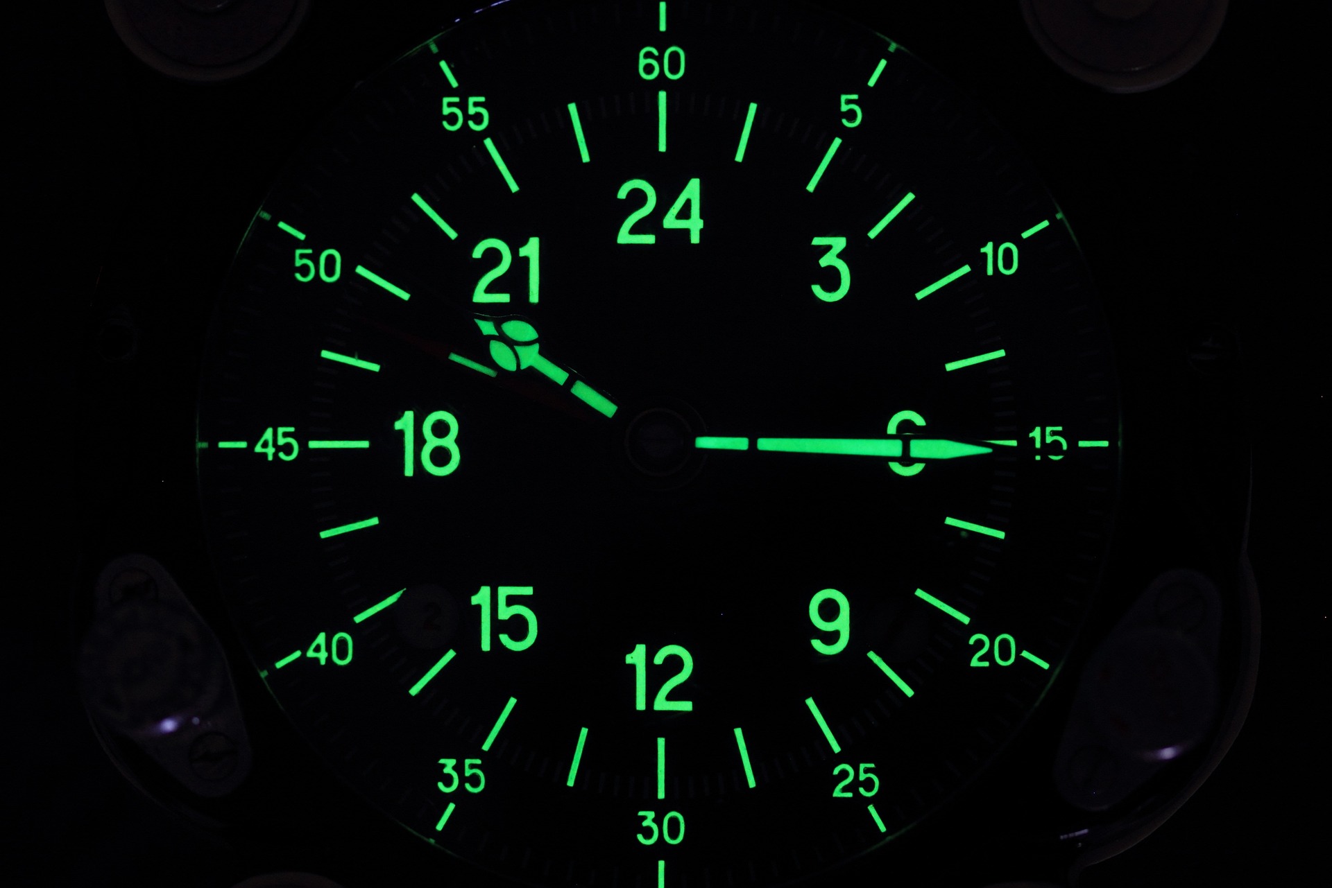 24-hour military clock with glowing green numbers